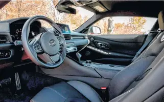  ?? POSTMEDIA NEWS ?? The interior of the new Supra has some tight confines.