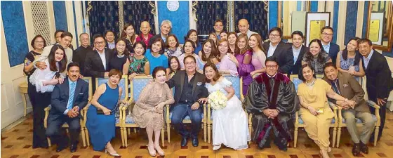  ??  ?? ... and with the Eat, Bulaga family and Supreme Court Associate Justice Andres Reyes III (seated, third from right) who presided over our civil rites.