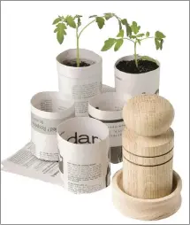  ??  ?? Paper pot makers make it easy to transform newspaper into biodegrada­ble plant pots that are perfect for starting seeds.