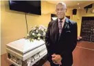  ?? CHRIS O’MEARA/AP ?? Wayne Bright, a funeral director at Wilson Funeral Home in Tampa, Fla., has seen grief piled upon grief during the state’s latest COVID-19 surge. The highly contagious delta variant is driving the deadly wave.