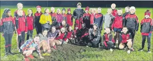  ?? ?? Mitchelsto­wn ladies football U12s with Shane Ronayne, the new Cork senior ladies football manager.