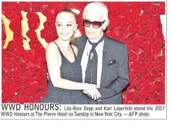  ??  ?? Lily-Rose Depp and Karl Lagerfeld attend the 2017