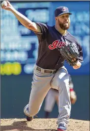  ?? PAUL BATTAGLIA / AP ?? The Cleveland Indians reportedly are still discussing trading Corey Kluber, but the Reds probably won’t be inclined to meet the asking price.