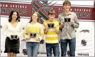  ?? ?? The following Siloam Springs cross country runners earned the “Heart of a Panther” award for the 2022 season: (from left) Faith Harris (senior high girls), Payton Lesso (junior high girls), Gaige Thompson (junior high boys), and Levi Fox (senior high boys).