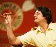  ??  ?? DOUBLE TOP: Eric Bristow in 1983 with his little finger cocked