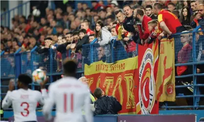  ??  ?? Montenegro fans during the qualifier against England. Photograph: Carl Recine/Action Images via Reuters