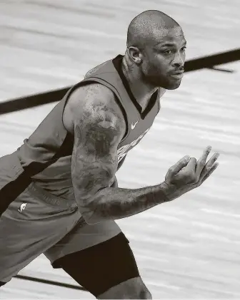  ?? Kevin C. Cox / Getty Images ?? Rockets forward P.J. Tucker said playing in the NBA’s bubble outside of Orlando, Fla., is similar to playing in empty YMCA gyms, despite virtual fans and piped-in crowd noise.
