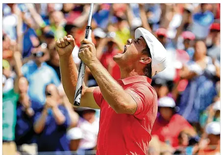  ?? ANDY LYONS / GETTY IMAGES ?? Bryson DeChambeau celebrates after fighting off two others in a playoff after the final round Sunday of the Memorial at Muirfield Village Golf Club in Dublin. DeChambeau three-putted the final hole of regulation before salvaging his second career PGA...