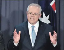  ?? MARK GRAHAM BLOOMBERG ?? Scott Morrison, Australia's prime minister-designate and leader of the Liberal Party, speaks during a news conference in Canberra on Friday.