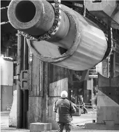  ??  ?? A workman is seen in the foundry at the Areva Creusot Forge site in Le Creusot. France has sold a 4.1-per cent stake in energy company Engie, pulling in 1.14 billion euros (US$1.2 billion) to help finance a state-led rescue of troubled nuclear firm...