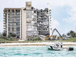  ?? AL DIAZ adiaz@miamiheral­d.com ?? Champlain Towers South, which partially collapsed in June 2021 in Surfside.