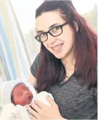  ??  ?? Happy mum Meghan Hamill, of Ayr, with son Tyler Watson who was born at the maternity unit on December 15, weighing 6lbs 13 oz