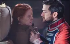  ?? BELL MEDIA ?? Zoe Boyle as Grace and Evan Jonigkeit as Captain Chesterfie­ld in Frontier.