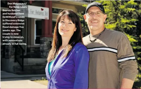  ??  ?? Don Molyneaux/
For Neighbours Brenda Belcher and husband Dave DeWilfond’s condo in Discovery Ridge suffered extensive flood damage five weeks ago. The couple is now trying to move on, with renovation­s already in full swing.