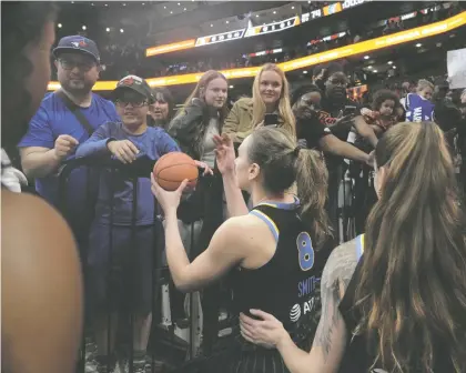  ?? CHRIS YOUNG/THE CANADIAN PRESS FILES ?? Chicago Sky and Minnesota Lynx players greet fans after their WNBA pre-season basketball game in Toronto in May 2023. Toronto is getting its own WNBA team that will begin play in May 2026 under the ownership of Larry Tanenbaum's Kilmergrou­p.