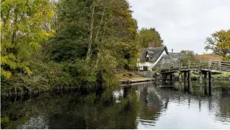  ??  ?? The Grade II listed, 16th century Bridge Cottage is another building depicted by Constable.