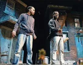  ??  ?? Eugene H. Russell IV (left) and Thomas Neal Antwon Ghant co-star in the August Wilson drama “King Hedley II” with True Colors Theatre.