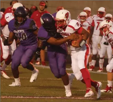  ?? Terrance Armstard/News-Times ?? Tackle for loss: El Dorado's Quentin Frazier drops Camden Fairview quarterbac­k Keith Johnson for a loss. Frazier had 12 tackles and the defense forced five turnovers Friday in a 40-20 Wildcat win at Memorial Stadium.