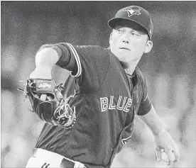  ?? FRED THORNHILL THE CANADIAN PRESS ?? Toronto Blue Jays starting pitcher Ryan Borucki throws against the Detroit Tigers in the first inning. Borucki pitched seven innings, allowing six hits and two runs, while striking out eight, in another impressive outing. However, the Jays lost, 3-2 in...