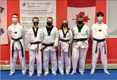  ?? SUBMITTED PHOTO ?? Swift Current Christian Taekwondo has six new black belts in their midst, after a rigorous testing process on March 20. From left to right: Ethan Klassen (1st degree), Logan, Steve and Callie Ebner (2nd degree), Carrie Voysey (3rd degree) and Carlos Marquez Peralta (1st degree).