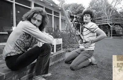  ??  ?? MONKEE BUSINESS
Eric Clapton (left) and Mickey Dolenz in Cass Elliot’s backyard in 1968, in a photograph captured by Diltz. “That’s me filming
Eric’s french fries,” says Dolenz, who was on the cusp of completing the second and final season of
The Monkees for NBC at the time. “I was saying to Eric, ‘Move out of the way.’ ”