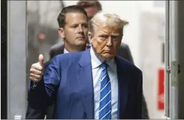  ?? JUSTIN LANE — POOL PHOTO VIA AP ?? Former President Donald Trump returns to the courtroom after a short recess during the second day of jury selection at Manhattan criminal court, Tuesday, in New York.