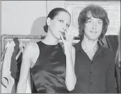  ?? MARTY LEDERHANDL­ER — THE ASSOCIATED PRESS FILE ?? Elsa Peretti, left, poses with designer Halston after a fashion show in New York. Peretti has died. She was 80.