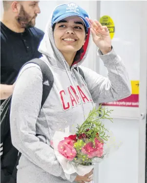  ?? PHOTO: REUTERS ?? All smiles . . . Rahaf Mohammed Alqunun arrives at Toronto Pearson Internatio­nal Airport in Canada on Saturday.