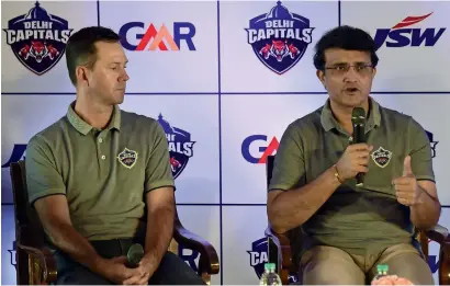  ?? AFP ?? Delhi Capitals special adviser Sourav Ganguly speaks as coach Ricky Ponting looks on during a press conference. —