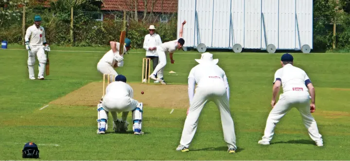  ?? ?? ●●Marple debutant Rob Kingham bowling to Hale Barns opener Joe Cooper, who hit a powerful 54