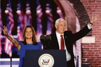  ?? Andrew Harnik / Associated Press 2020 ?? Former Vice President Mike Pence and his wife, Karen, appear at the Republican National Convention from Baltimore in 2020. He is offering a “Freedom Agenda” platform.