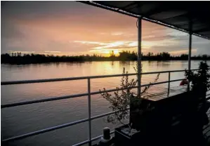  ?? PHOTO: G ADVENTURES ?? Sunset on the sun deck of the Toum Tiou II.