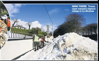  ??  ?? HIGH THERE Troops clear Ireland’s highest village in Co Wicklow