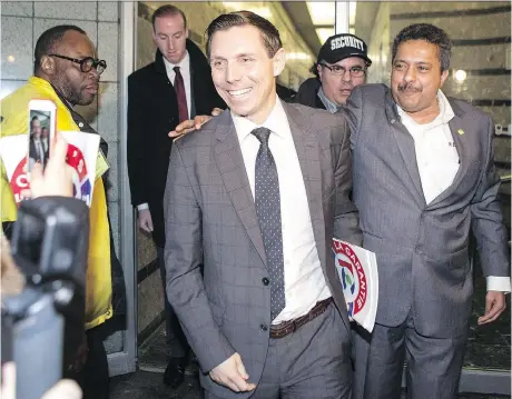 ?? CHRIS YOUNG/THE CANADIAN PRESS ?? Ontario PC leadership candidate Patrick Brown leaves the party’s head offices Tuesday in Toronto. Brown was given the OK Wednesday following the candidate-vetting process, so he can continue his bid to lead the party through the spring election.