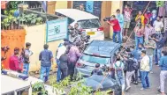  ??  ?? Actress Rhea Chakrabort­y's father Indrajit Chakrabort­y and mother Sandhya Chakrabort­y arrive at DRDO guest-house for questionin­g