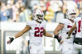  ?? JOHN HEFTI — THE ASSOCIATED PRESS ?? Stanford running back Cameron Scarlett celebrates after he scored a touchdown against California in the fourth quarter of a football game in Berkeley, Calif. on Saturday.