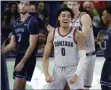  ?? YOUNG KWAK - THE ASSOCIATED PRESS ?? Gonzaga guard Julian Strawther celebrates his basket during the second half of an NCAA college basketball game against San Diego in Spokane, Wash., Saturday, Feb. 20, 2021.