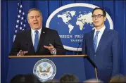  ?? J. SCOTT APPLEWHITE / ASSOCIATED PRESS ?? Secretary of State Mike Pompeo (left) and Treasury Secretary Steven Mnuchin present details of the new sanctions on Iran at the Foreign Press Center on Monday in Washington.