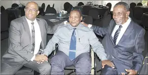  ?? ?? Dr Phil Mnisi (L), Federation Organisati­on of the Disabled People in Eswatini President Sipho Dlamini (C) and ECAS President Professor Mike Matsebula having a discussion on the equality of the national budget.