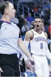  ?? SUE OGROCKI /THE ASSOCIATED PRESS ?? Oklahoma City Thunder guard Russell Westbrook has words for official Matt Boland in recent NBA action.