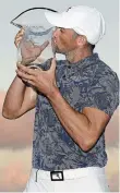  ?? GETTY IMAGES FILE PHOTO ?? Ben Silverman of Canada poses with the trophy after winning in a playoff during the final round of The Bahamas Great Abaco Classic last week in Great Abaco, Bahamas.