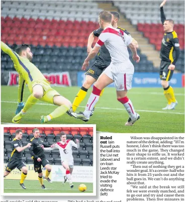  ??  ?? Ruled out Iain Russell puts the ball into the Livi net (above) and on-loan Leeds star Jack McKay tried to evade the visiting defence (left)