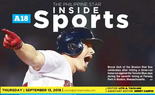  ??  ?? Brock Holt of the Boston Red Sox celebrates after hitting a three-run home run against the Toronto Blue Jays during the seventh inning at Fenway Park in Boston, Massachuse­tts.