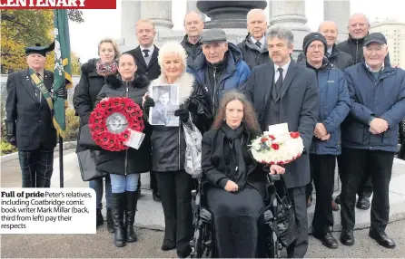  ??  ?? Full of pride Peter’s relatives, including Coatbridge comic book writer Mark Millar (back, third from left) pay their respects