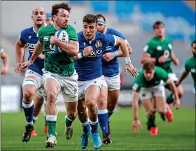  ??  ?? STROLLING IT: Hugo Keenan runs in a try for Ireland at the Stadio Olimpico