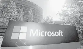  ?? Outvesa Moilanen / AFP / Getty Images ?? Microsoft’s Finnish headquarte­rs in Espoo received the bulk of the layoffs as the company announced Wednesday that it is shutting down mobile device research and developmen­t operations in Finland with the loss of some 1,350 jobs.