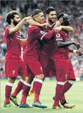  ?? FOTO: GYI ?? Salah, Firmino, Can y Mané celebran el gol del senegales, segundo de los ‘reds’