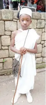  ?? ?? Catching them young. This Afizere boy led a group of older men during the carnival procession on the Museum Day 2022 in Jos