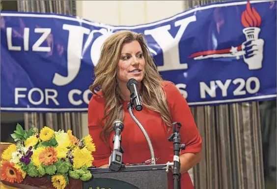  ?? Lori Van Buren / Times Union archive ?? Liz Joy speaks to her supporters at the podium during a Liz Joy for Congress Watch Party on Election Day at Schenectad­y’s River Stone Manor last year. Joy is the GOP challenger to incumbent U.S. Rep. Paul Tonko, D-amsterdam, again next year.