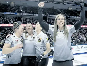  ?? THE CANADIAN PRESS ?? Skip Rachel Homan of Ottawa pumps her fists as (from left) second Joanne Courtney, third Emma Miskew and lead Lisa Weagle celebrate defeating Team Carey in the women’s final.